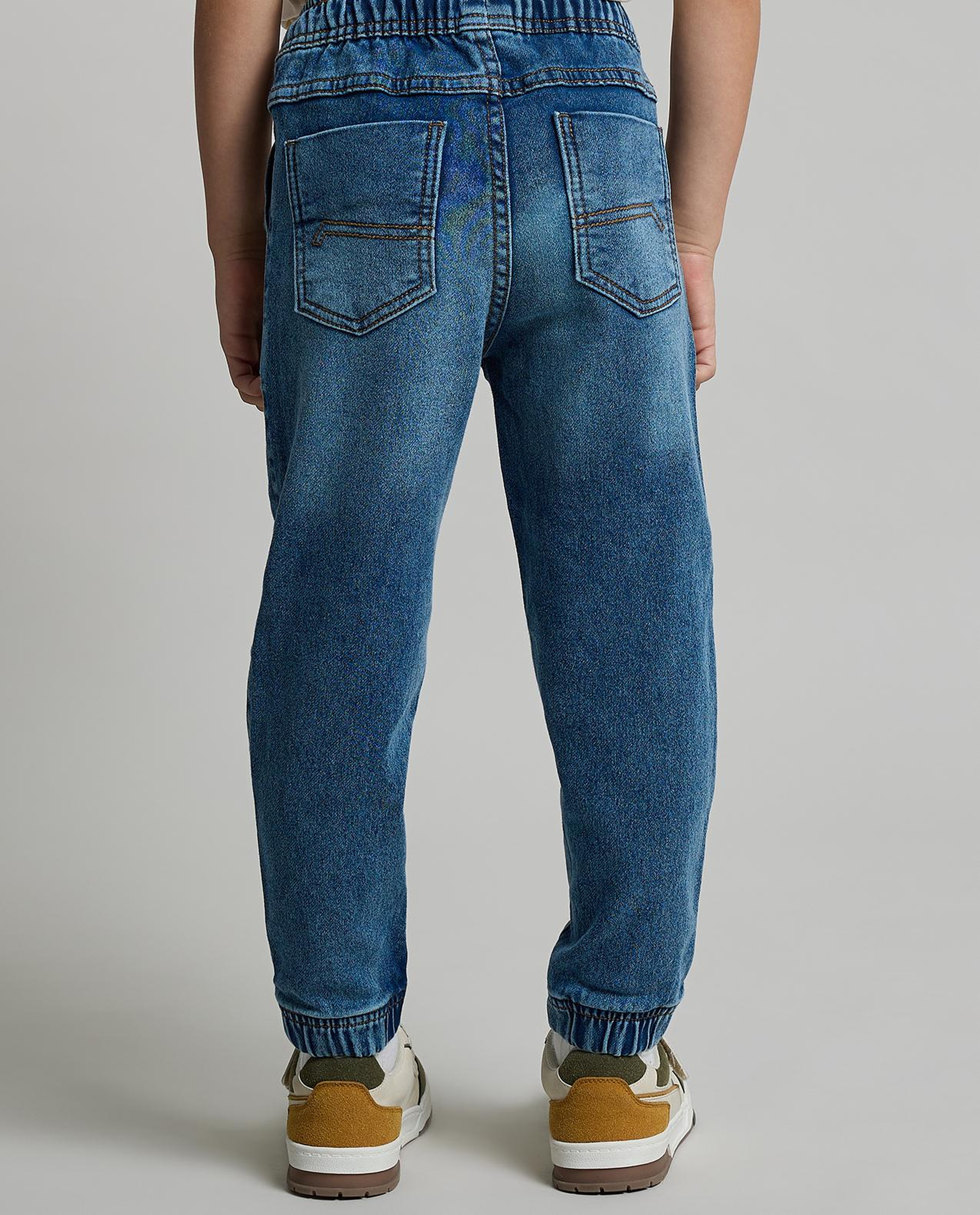 Faded Slim Fit Jeans with Button Closure