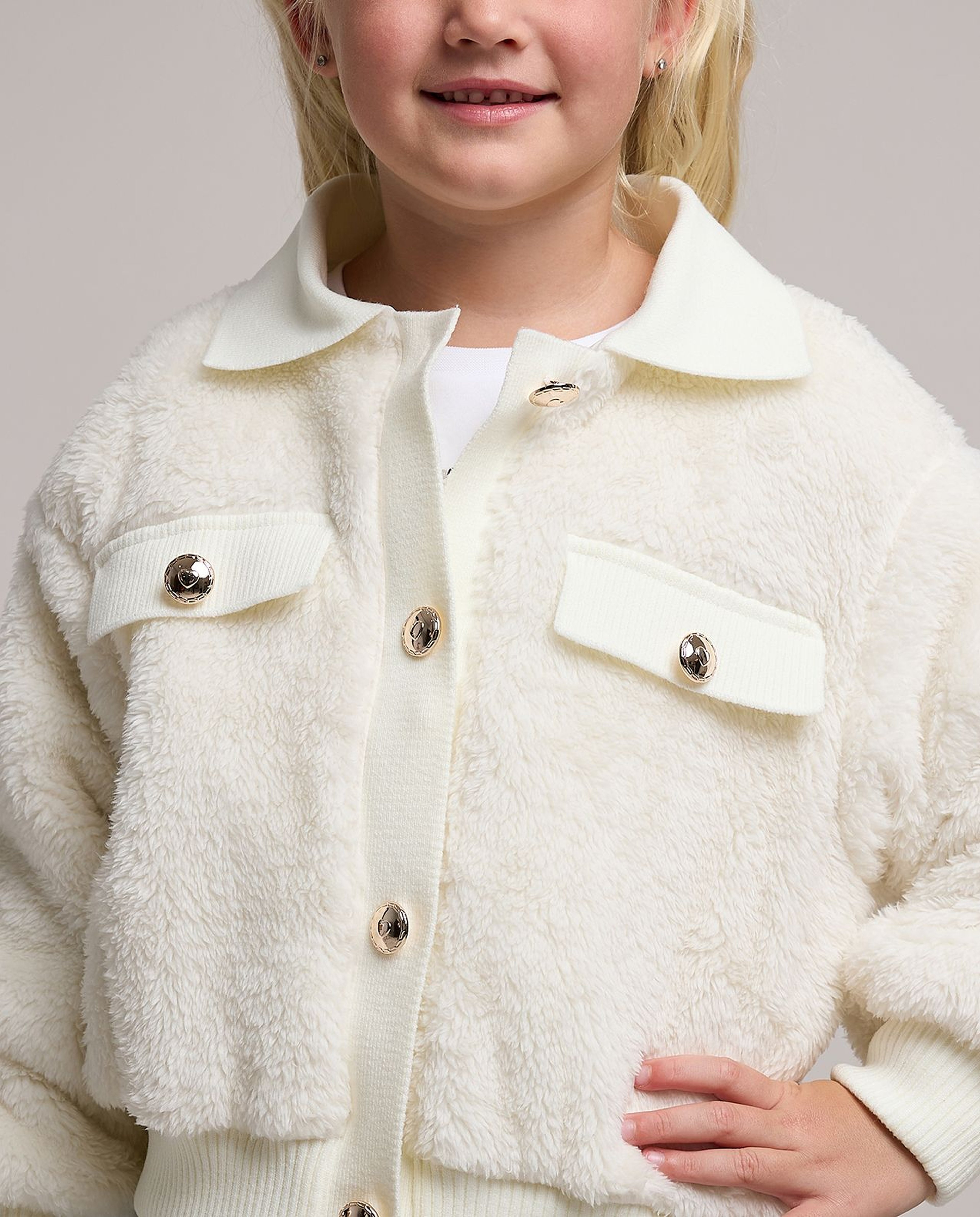 furry jacket with button closure