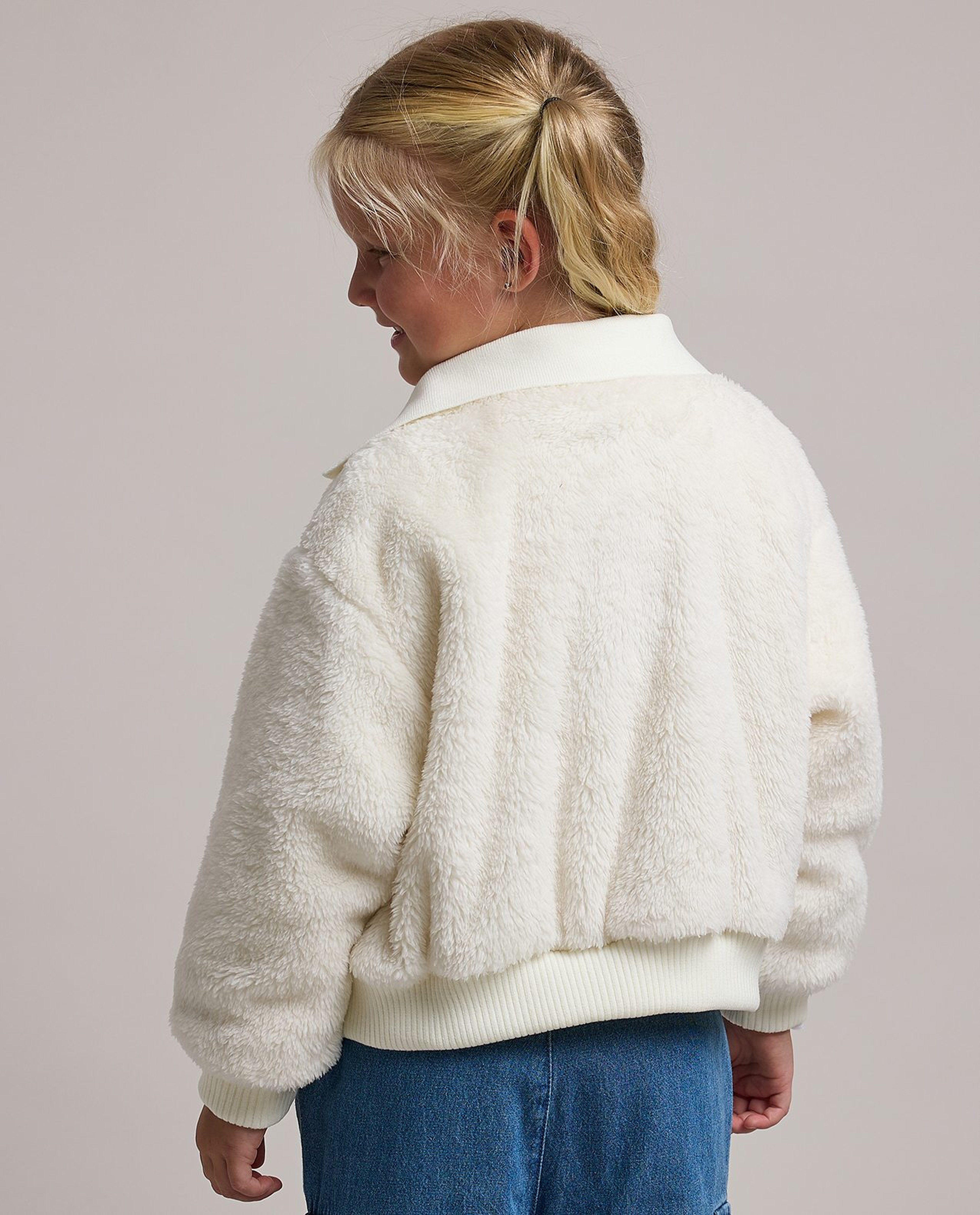 furry jacket with button closure