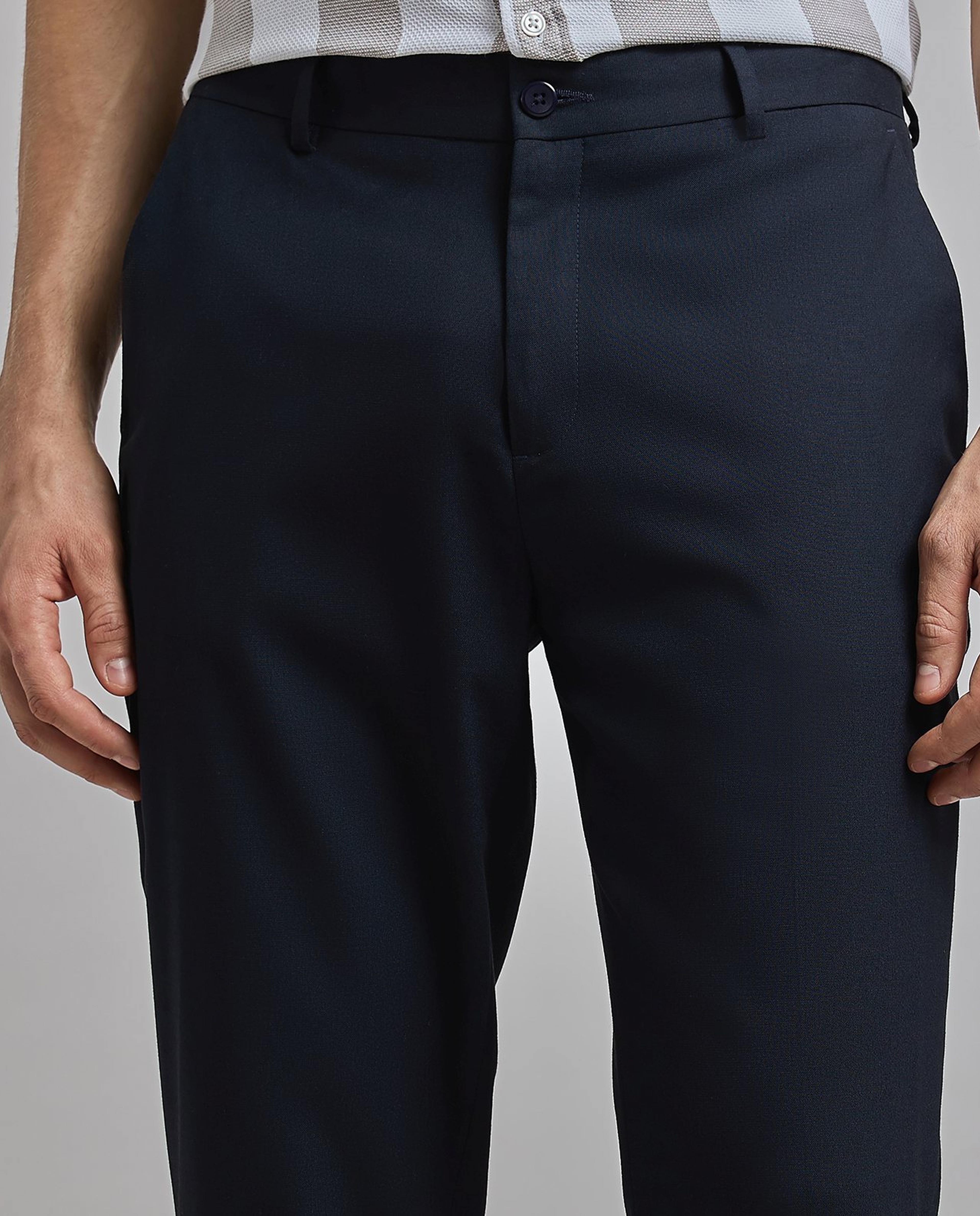 Solid Tapered Fit Trousers with Button Closure