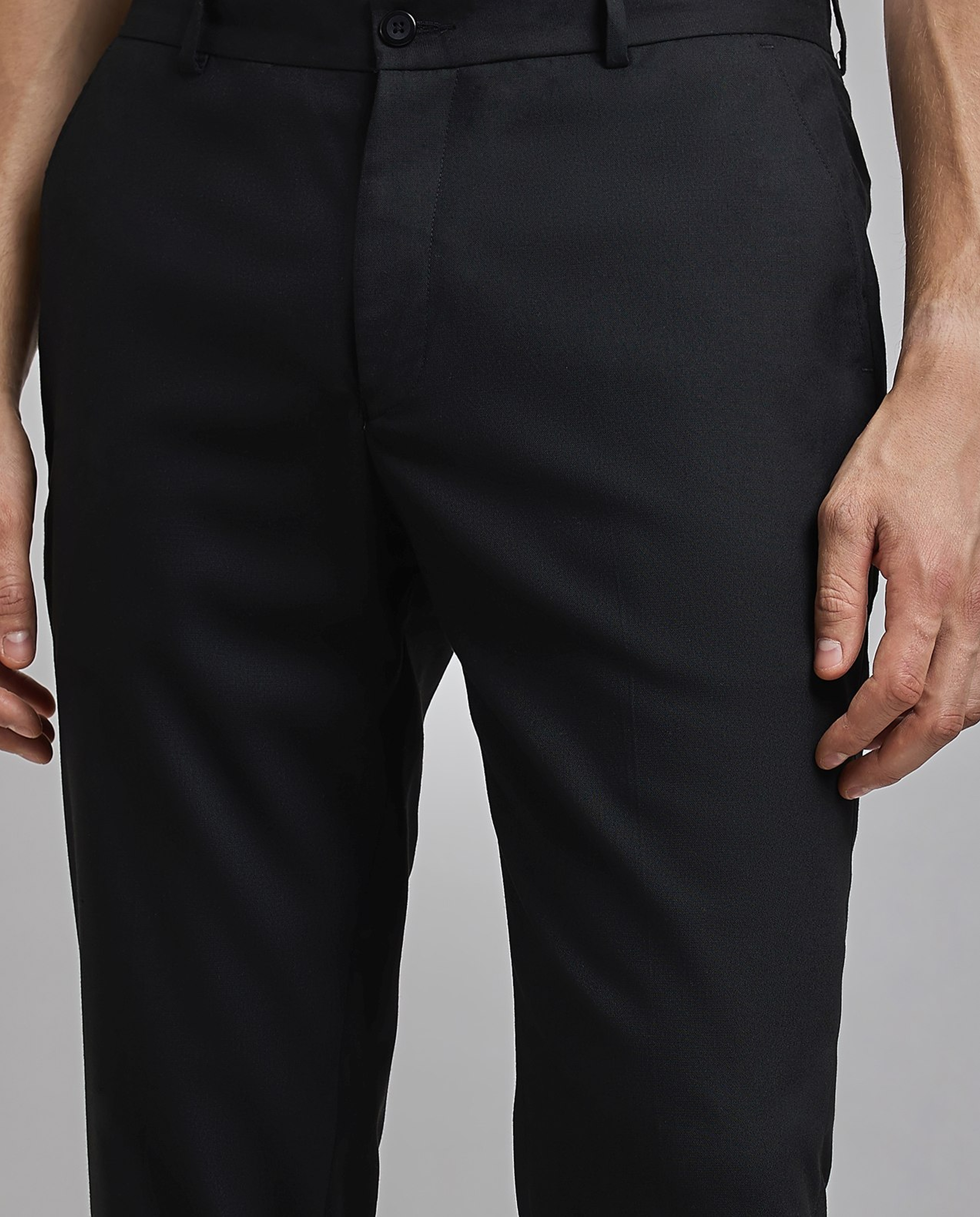 Solid Tapered Fit Trousers with Button Closure