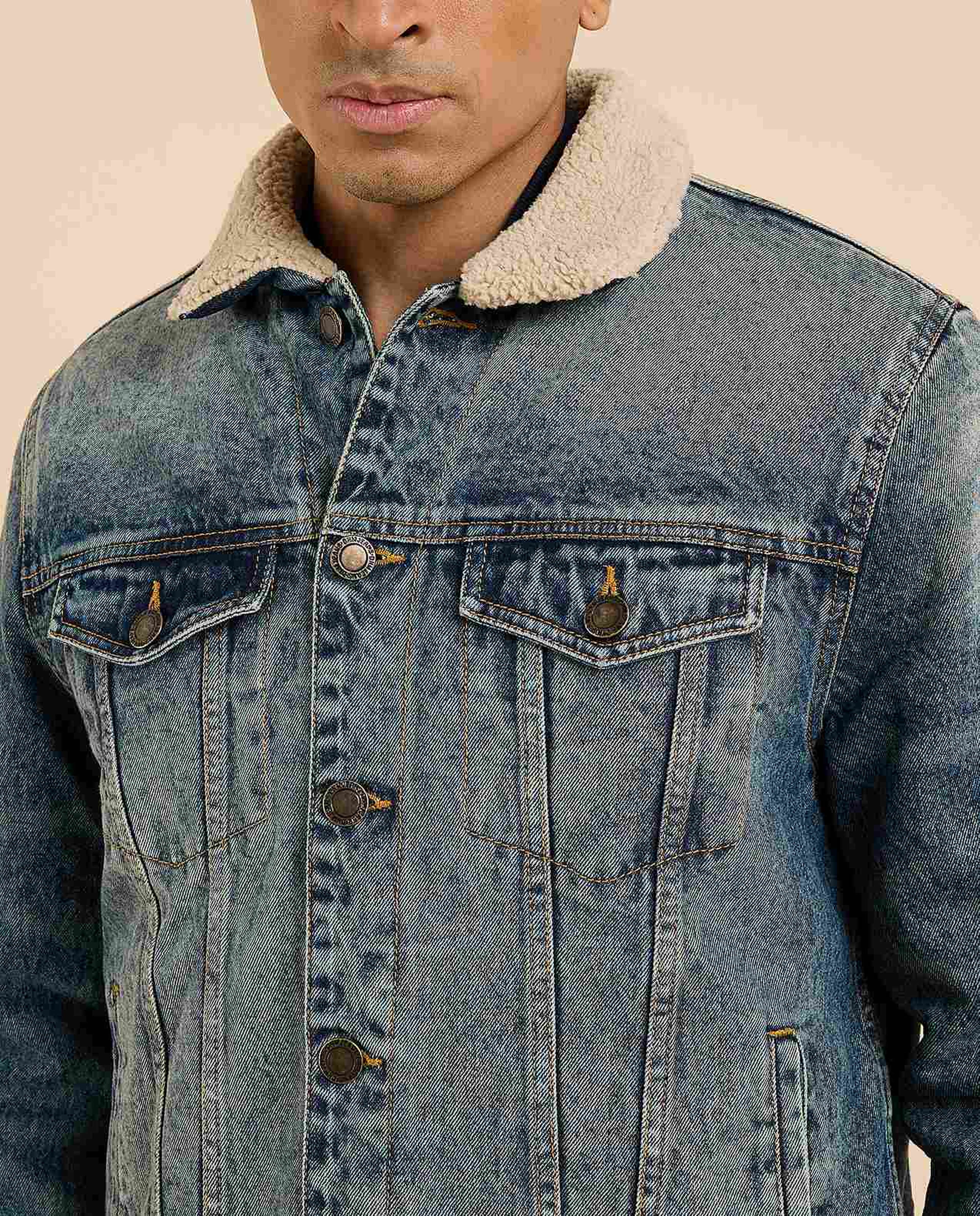 Faded Denim Jacket with Button Closure