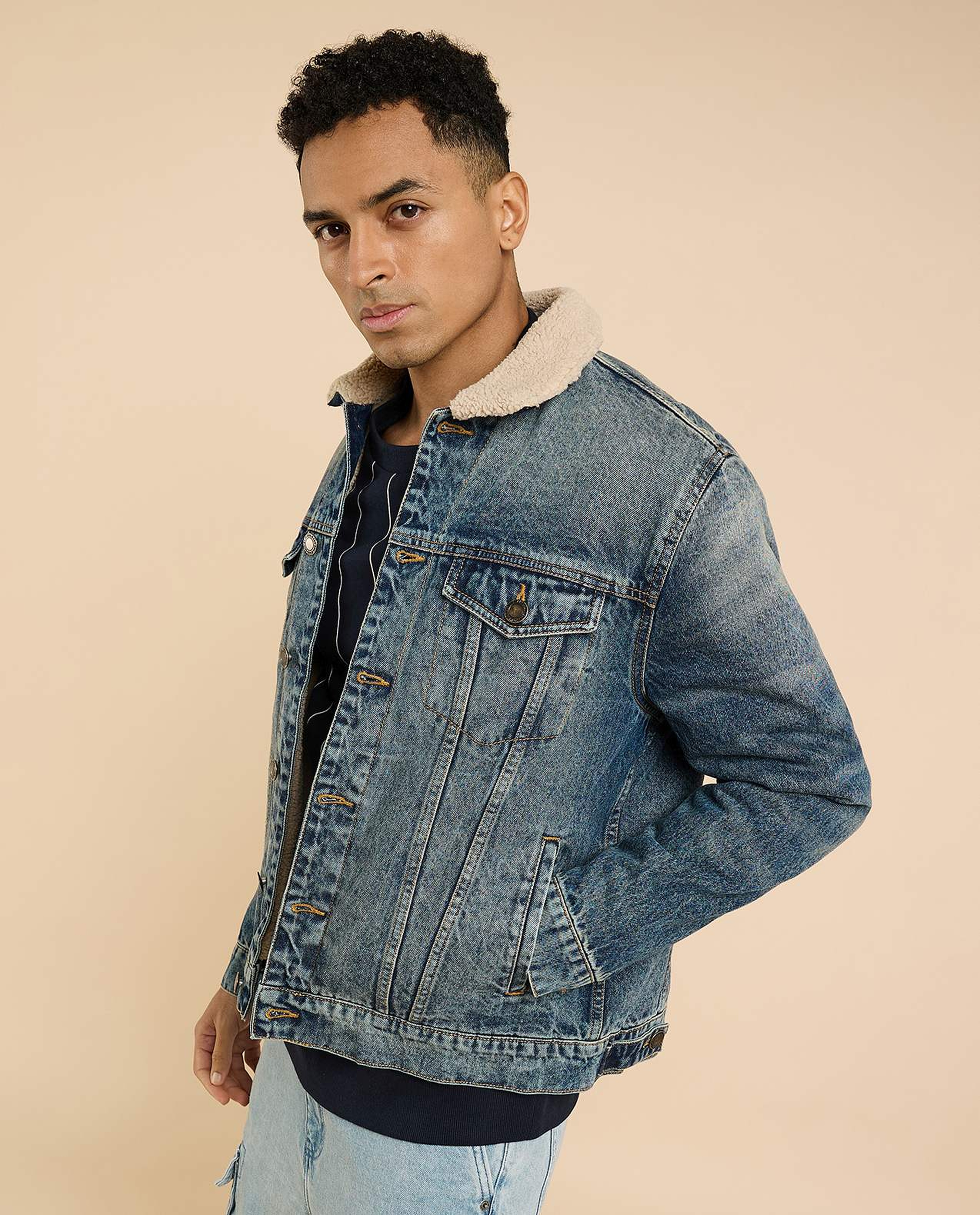 Faded Denim Jacket with Button Closure