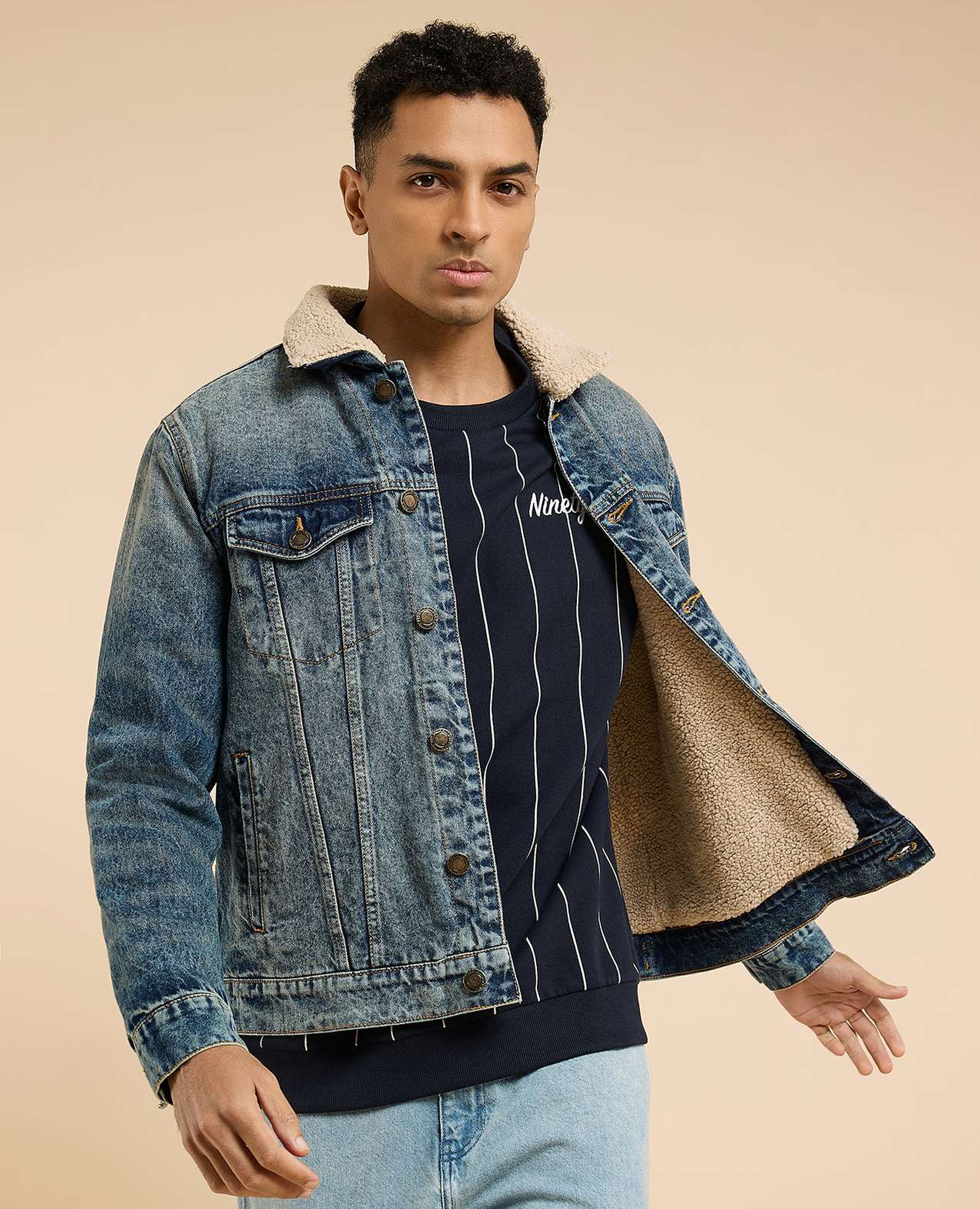 Faded Denim Jacket with Button Closure